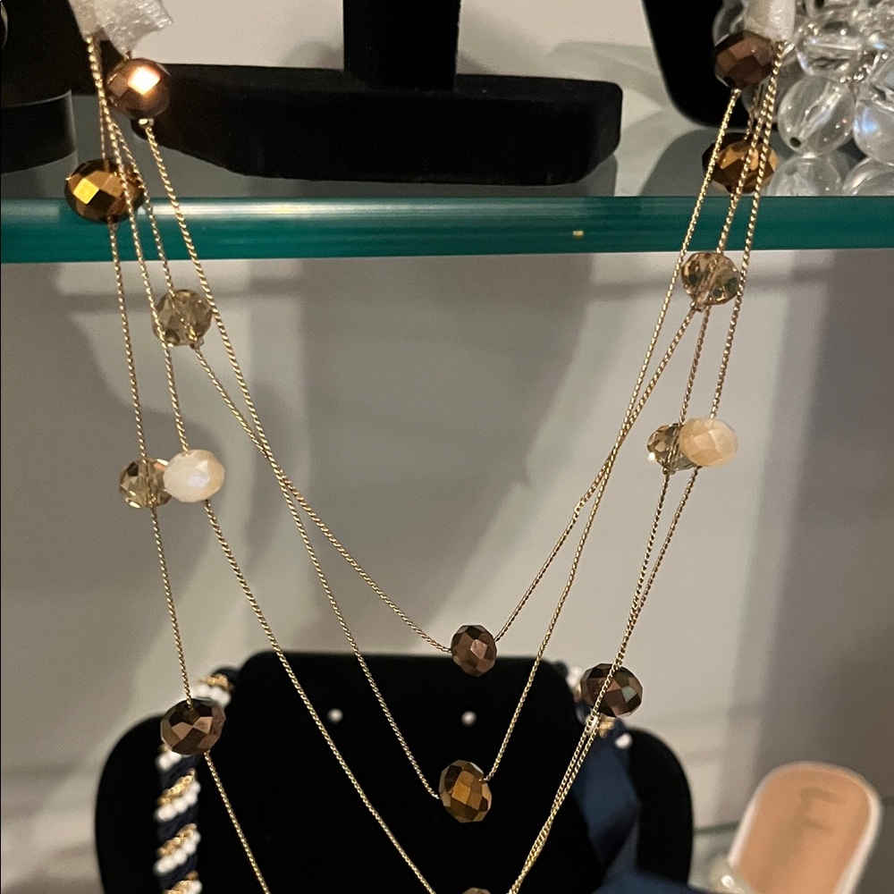 #0084.    The Limited Gold and Brown Multi-Strand Necklace